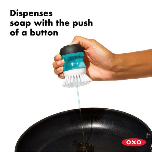 Soap Dispensing Palm Brush - US 5675